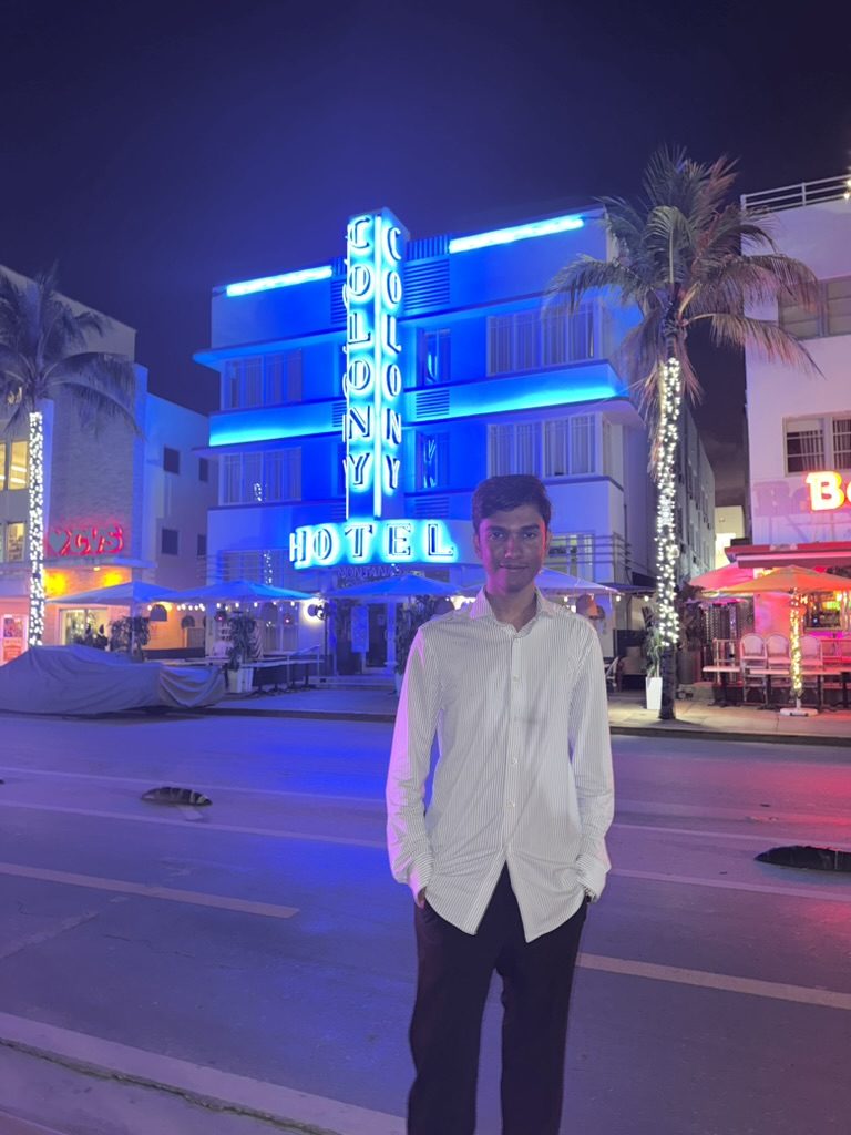 Priyam on Ocean Drive in front of the Colony Hotel neon at night