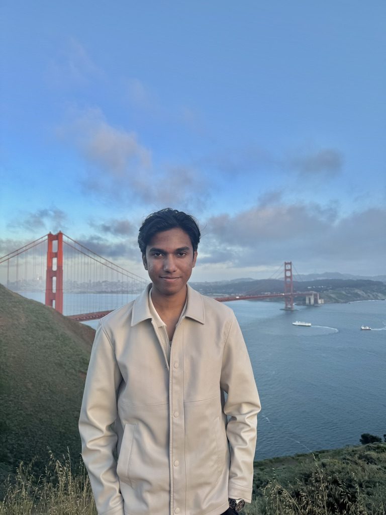 Priyam in front of the Golden Gate Bridge from the Marin Headlands